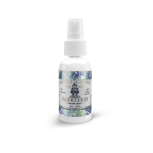 A white room mist spray bottle with a label featuring a lighthouse and floral elements. The cap of the bottle is white, and it is designed for home fragrance.
